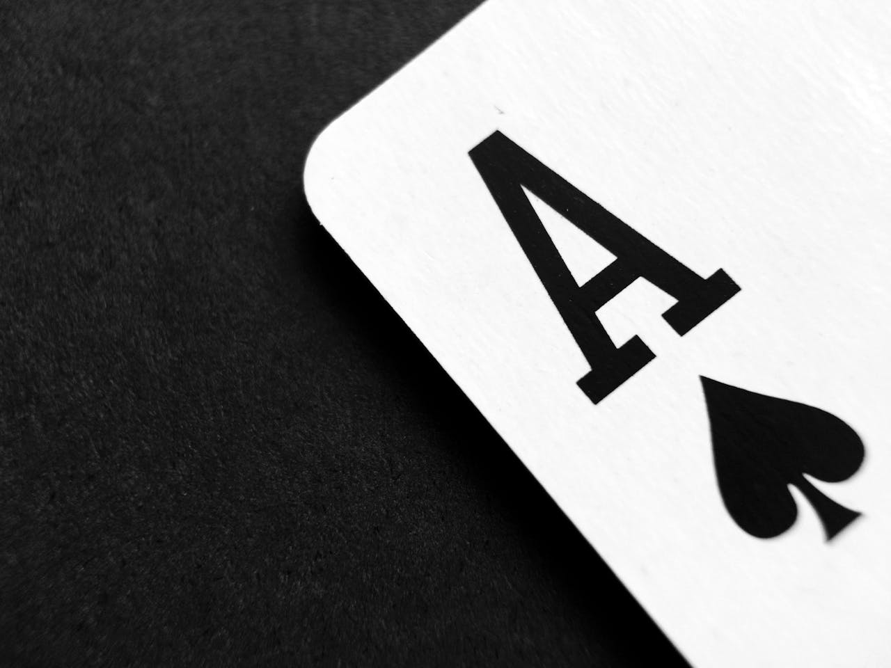 services-06 Detailed view of an Ace of Spades card symbolizing luck and strategy.