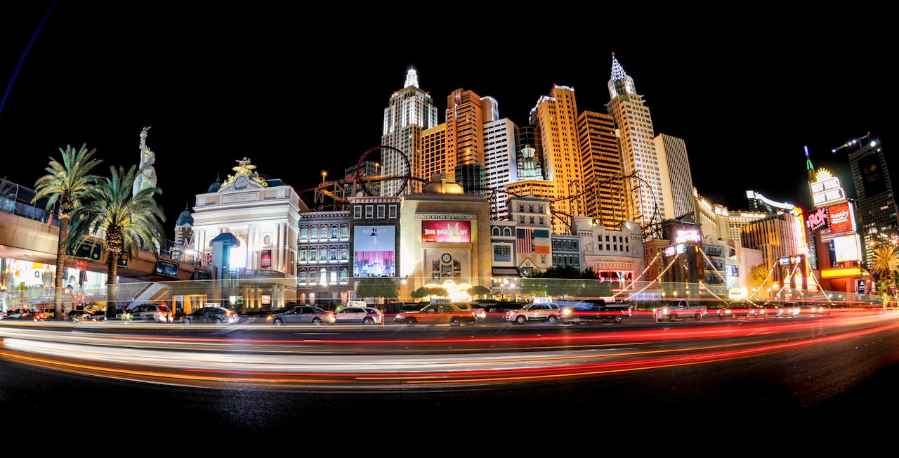 get-in-touch Illuminated cityscape of the Las Vegas Strip featuring iconic architecture and dazzling lights at night.